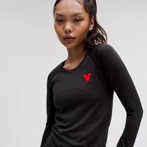 Disney Lululemon limited edition swiftly tech top sz 4